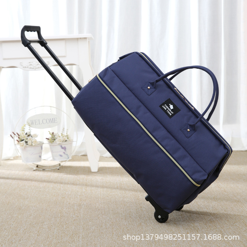 Nuevo bolso de la carretilla maleta bolsa de embarque impermeable para hombres y mujeres bolsa de viaje portátil color a juego bolsa de carro de rueda unidireccional