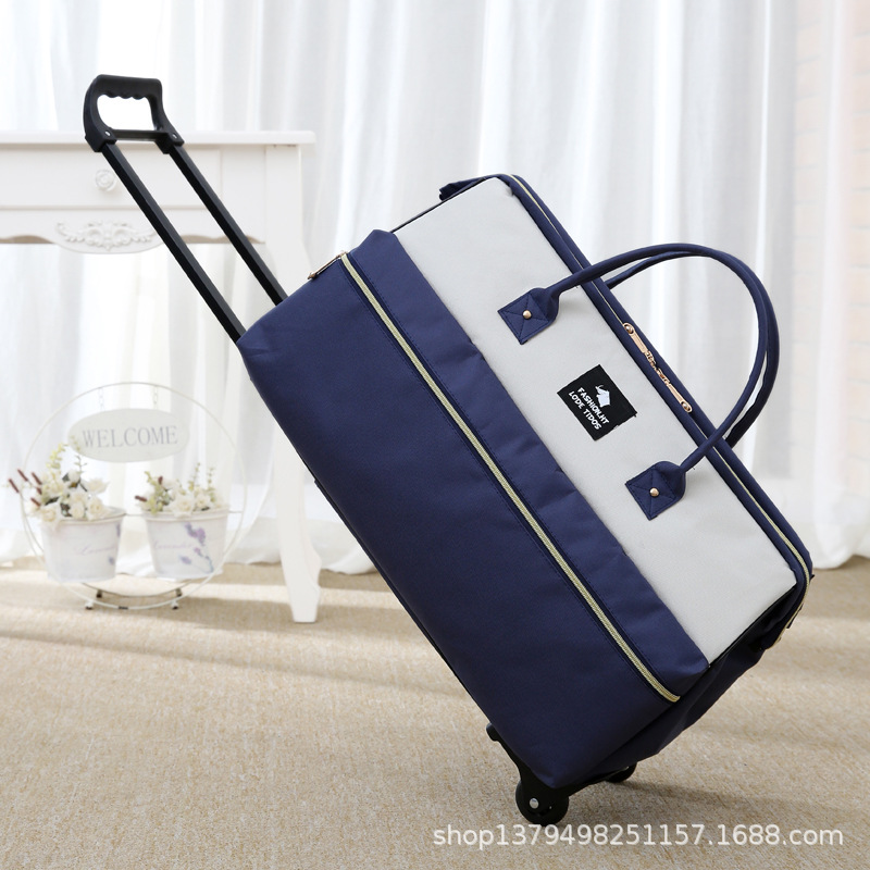 Nuevo bolso de la carretilla maleta bolsa de embarque impermeable para hombres y mujeres bolsa de viaje portátil color a juego bolsa de carro de rueda unidireccional