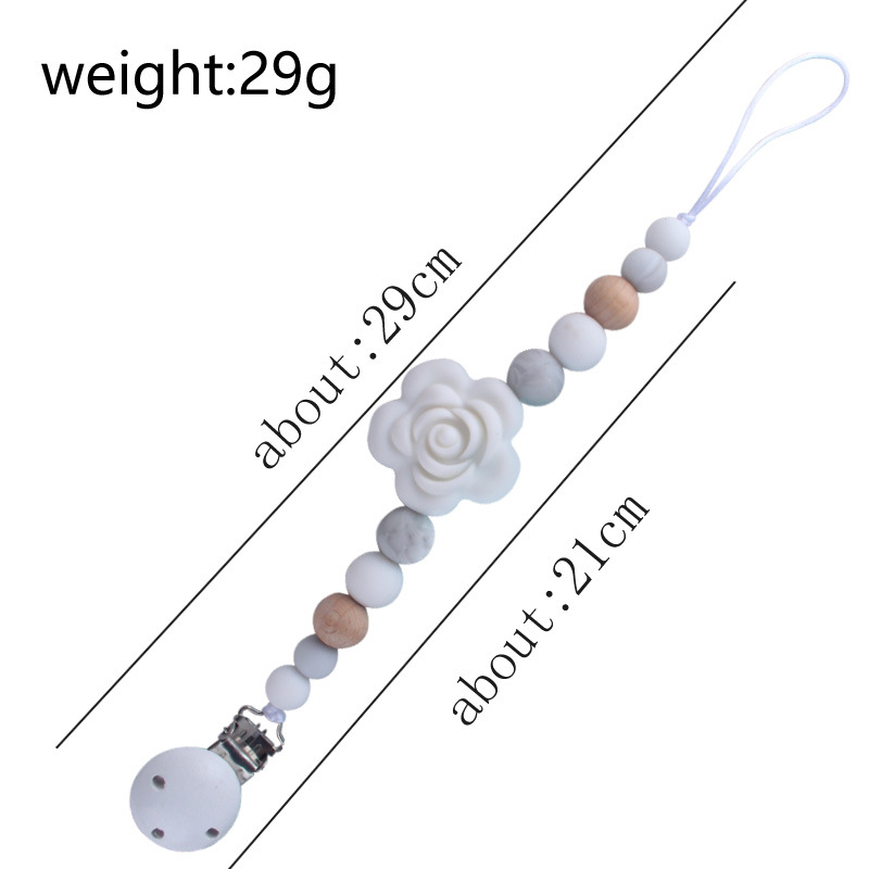 Cadena de chupete de silicona para bebés Amazon Cadena de molienda de dientes de bebés cadena anti-Caída de mordedor calmante personalizada por los fabricantes