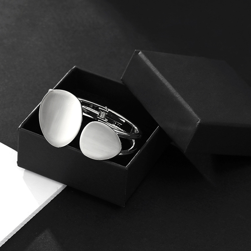 Hollow Asymmetrical Oval Alloy Open Bracelet