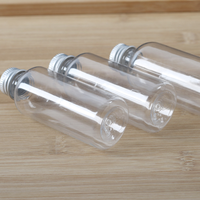 Tapa de aluminio transparente botella de plástico ordinario tapa de tornillo de plástico botella de loción de agua cosmética sub-botella de plástico pequeña botella vacía