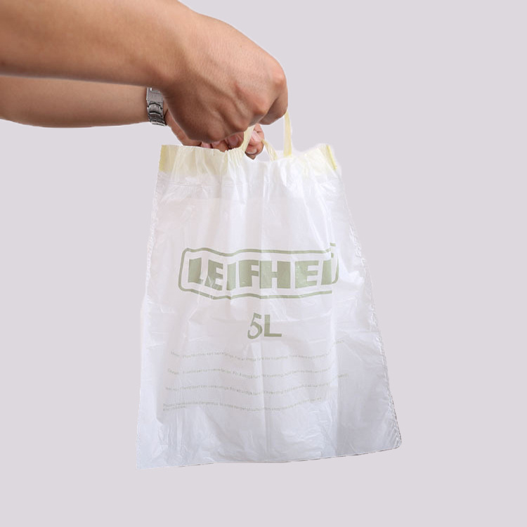 廠家生産批發全新PO料印刷穿繩連卷垃圾袋奶白出口垃圾袋34x34cm