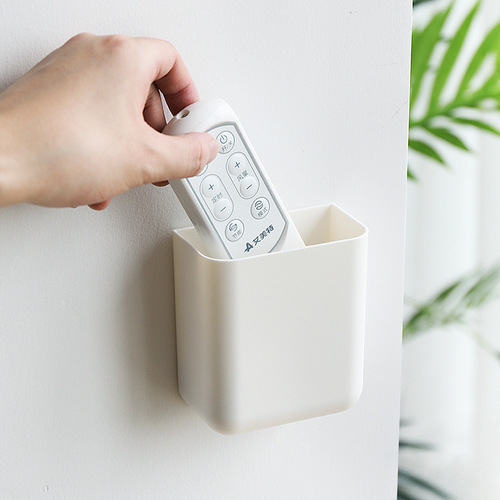 Creative remote control storage box wall hanging household garbage bag storage rack plastic storage box household products