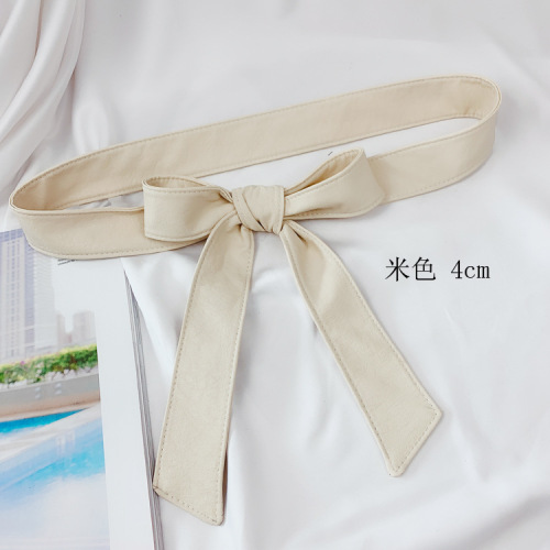Leather-wrapped belt with fur decoration, PU leather strap, minimalist leather belt with bow detail, suitable for trench coats and overcoats.
