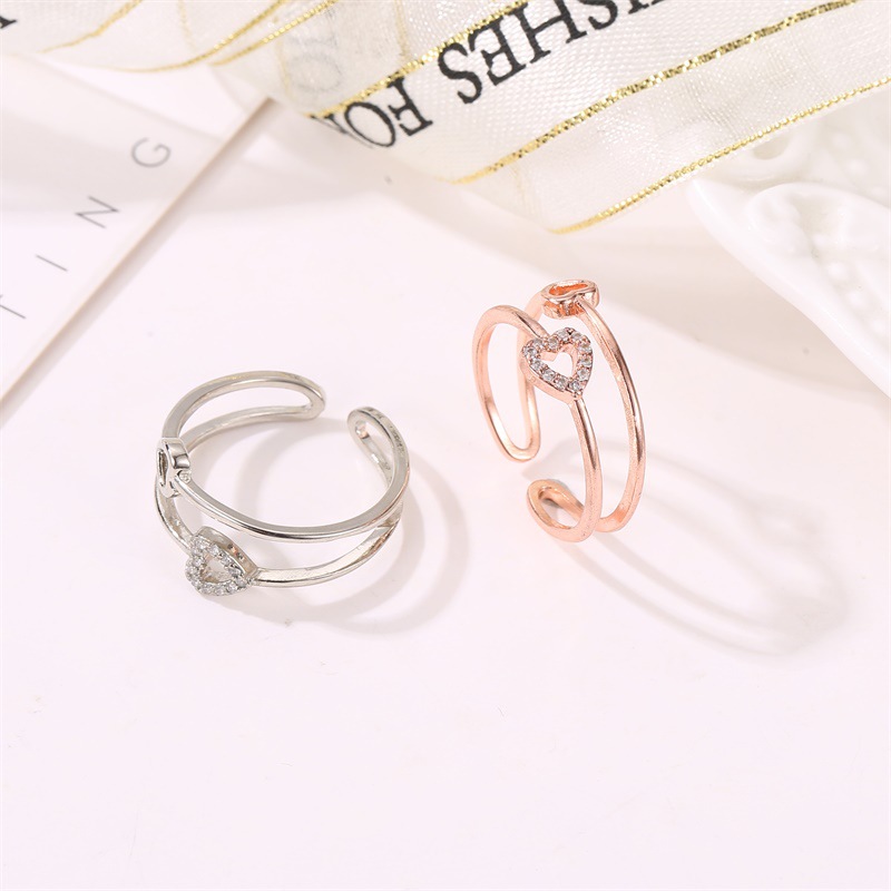 Außenhandel Neue Stil Ring Hands Chmuck Europäische Und Amerikanische Mode Liebe Zirkon Damen Ring Einfache Hohle Offene Ring Accessoires display picture 4