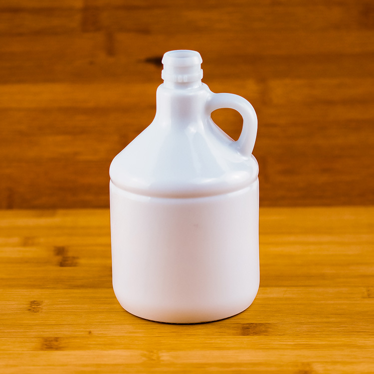 厂家制作500ml异形带把手圆形牙口白色陶瓷玻璃瓶子 一斤装白酒瓶