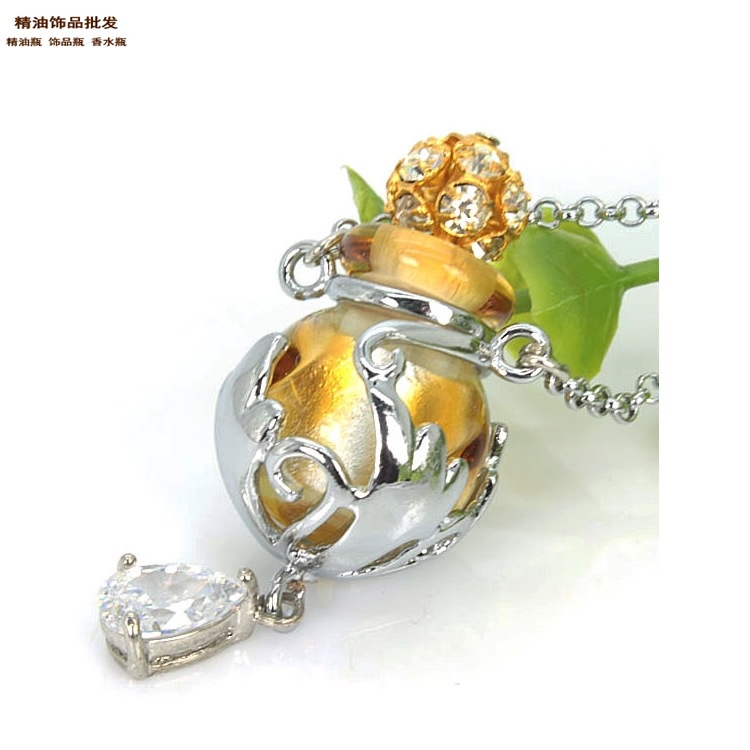 中国精油饰品网幻彩金黄瓶流星花园项链吊坠5.jpg