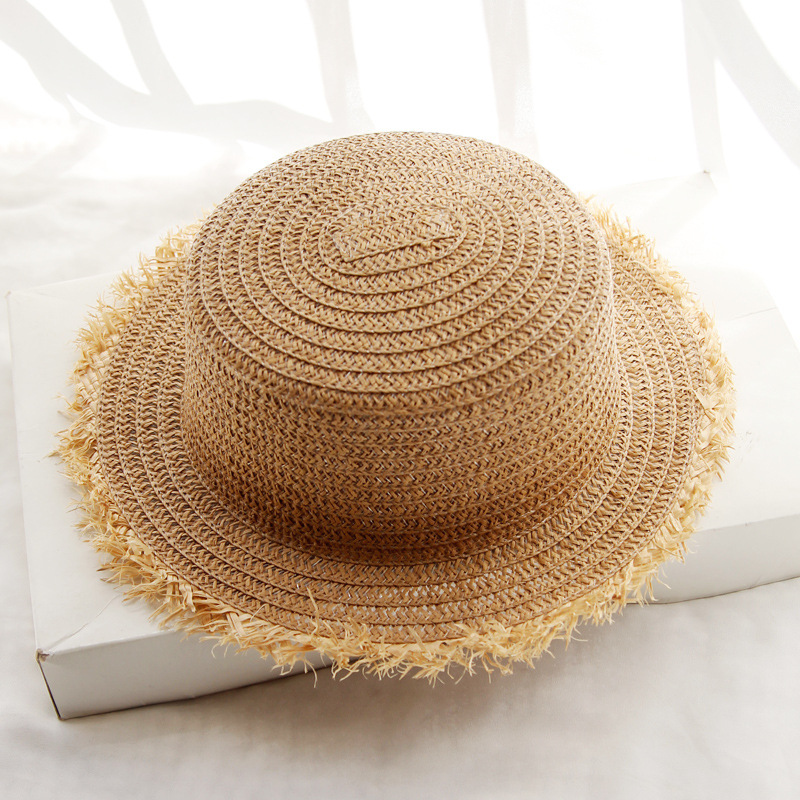 Women's Vacation Beach Solid Color Flat Eaves Straw Hat display picture 2