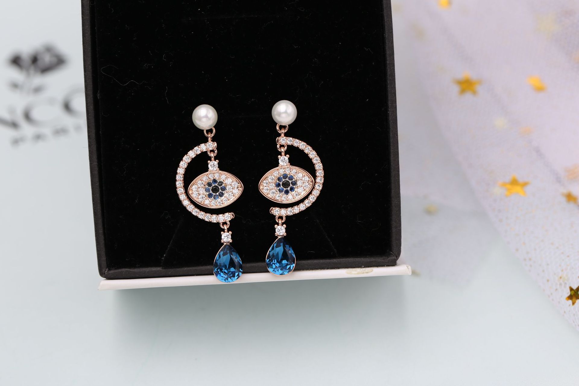 2019 Nuevos Aretes De Ojo De Diablo Con Circón 925 Aretes De Aguja De Plata Temperamento De Perlas Red Red Wild Ear Jewelry display picture 11