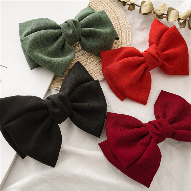 Women's Simple Style Bow Knot Cloth Braid Hair Clip display picture 1