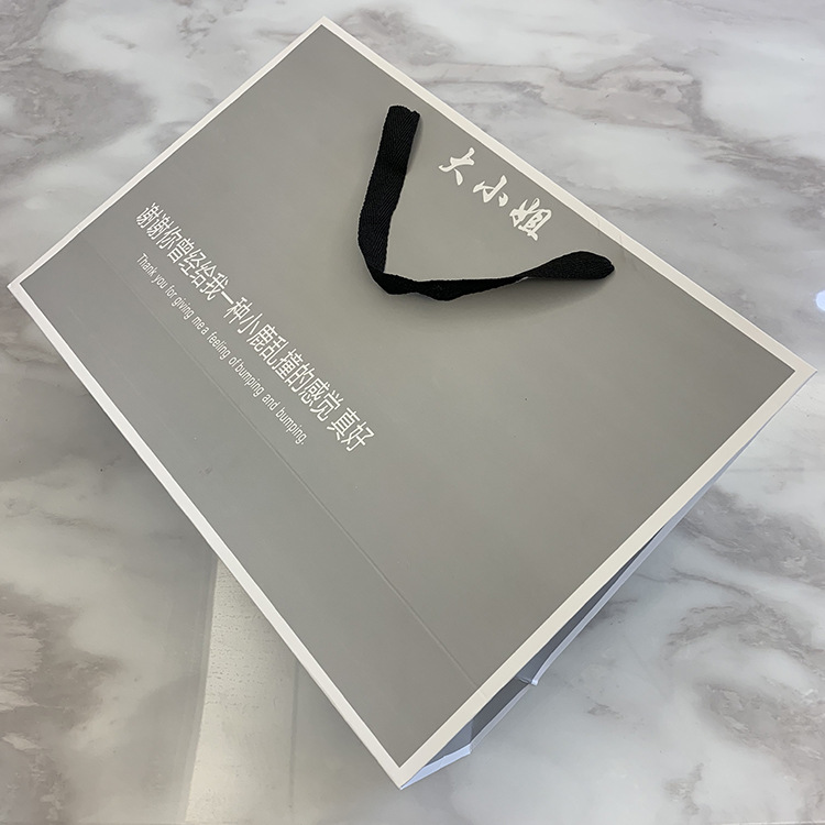 厂家手提纸袋定做环保牛皮纸袋服装手提公司购物袋礼品袋定制LOGO