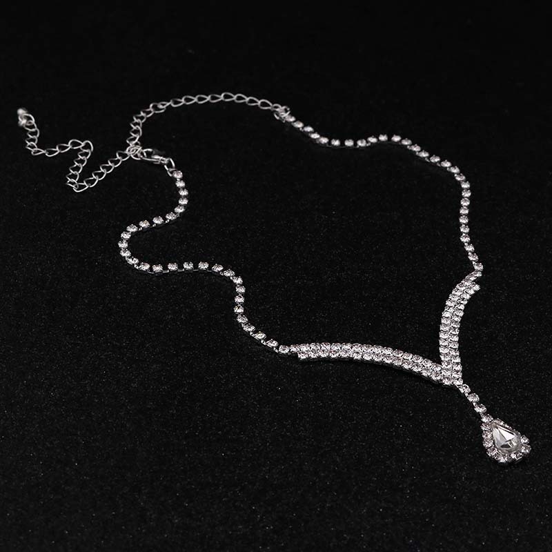 Designer-Stil, modisches Volldiamant-Halsketten-Ohrnagel-Set mit Tropfen-Anhänger und V-Ausschnitt_voghion.com