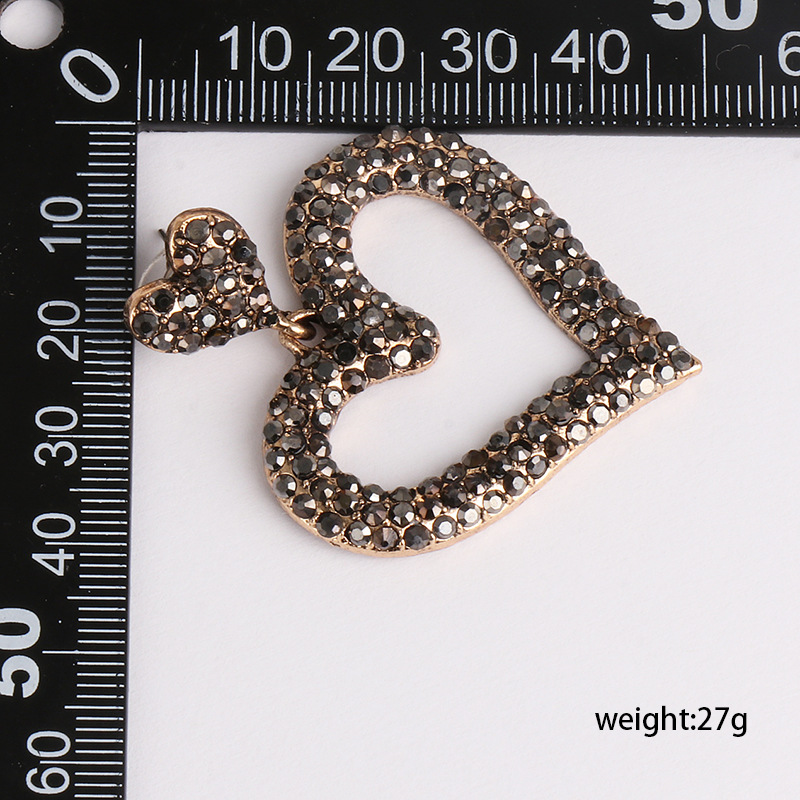 Nuevos Pendientes Simétricos En Forma De Corazón Con Micro Diamantes display picture 1