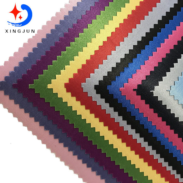 厂家直供人造皮革面料色丁发泡面料 耐磨刮发泡料箱包面料