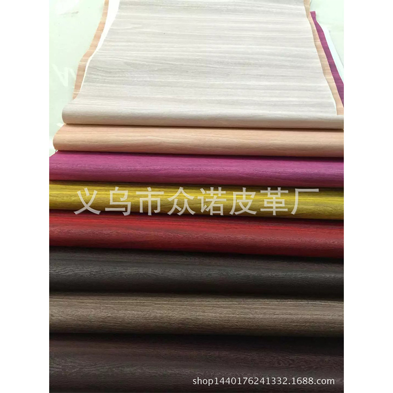 厂家现货批发新款PVC木纹人造革 电子包装革酒店装饰皮具用品面料