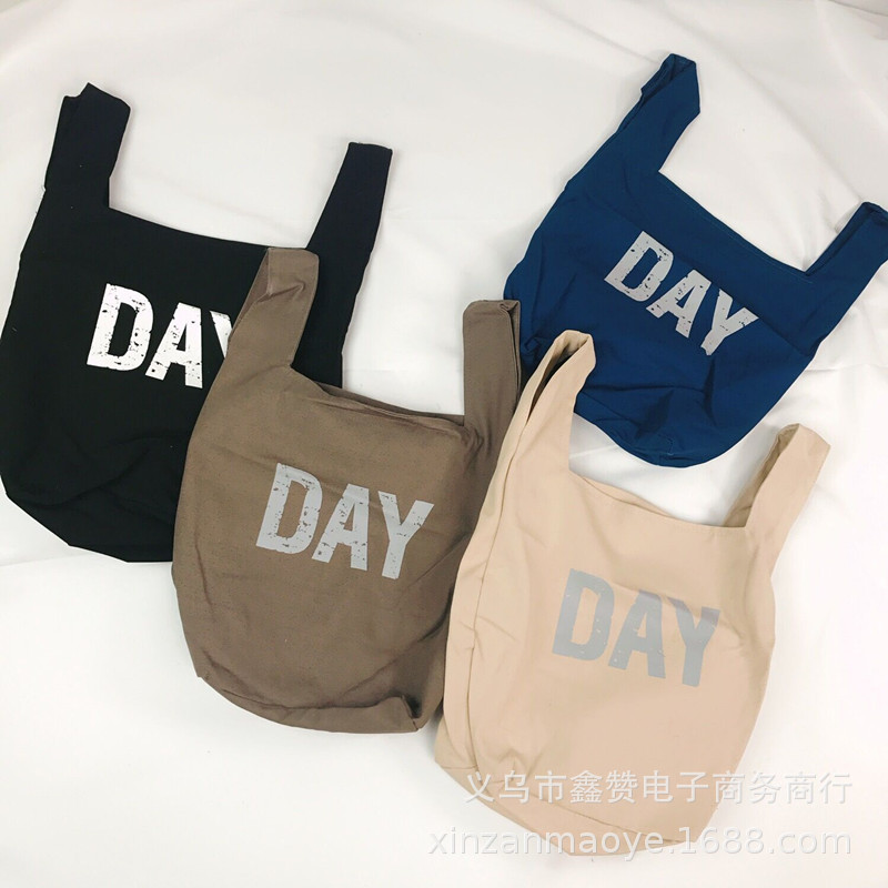 兒童包包2019春夏新款ins帆布手拎包潮字母百搭手提單肩斜跨包女