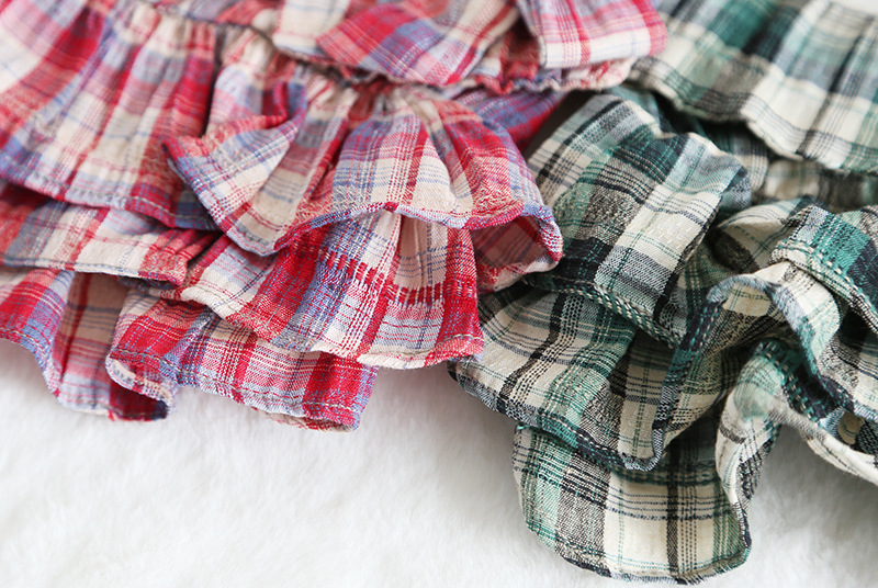 彩格口袋拼接裙