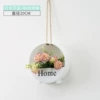 White flower basket+pink ball chrysanthemum