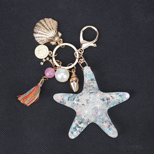 Factory direct supply European style new starfish keychain creative tassel car pendant alloy ladies bag pendant