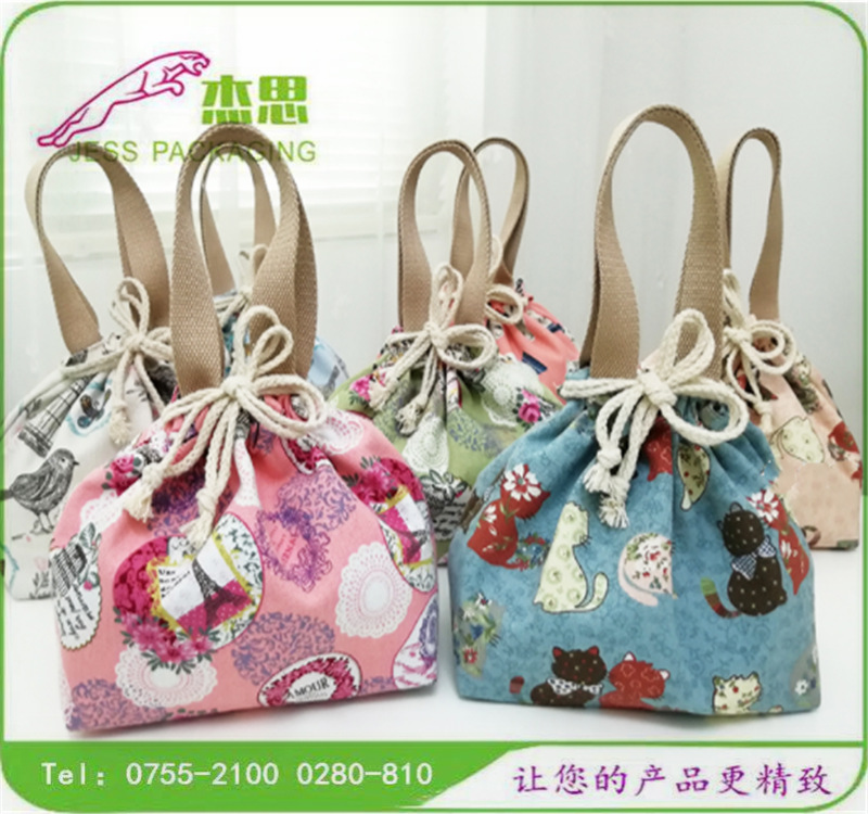 设计新款复古帆布手提饭盒包创意水桶束口袋喵咪印花收纳布包