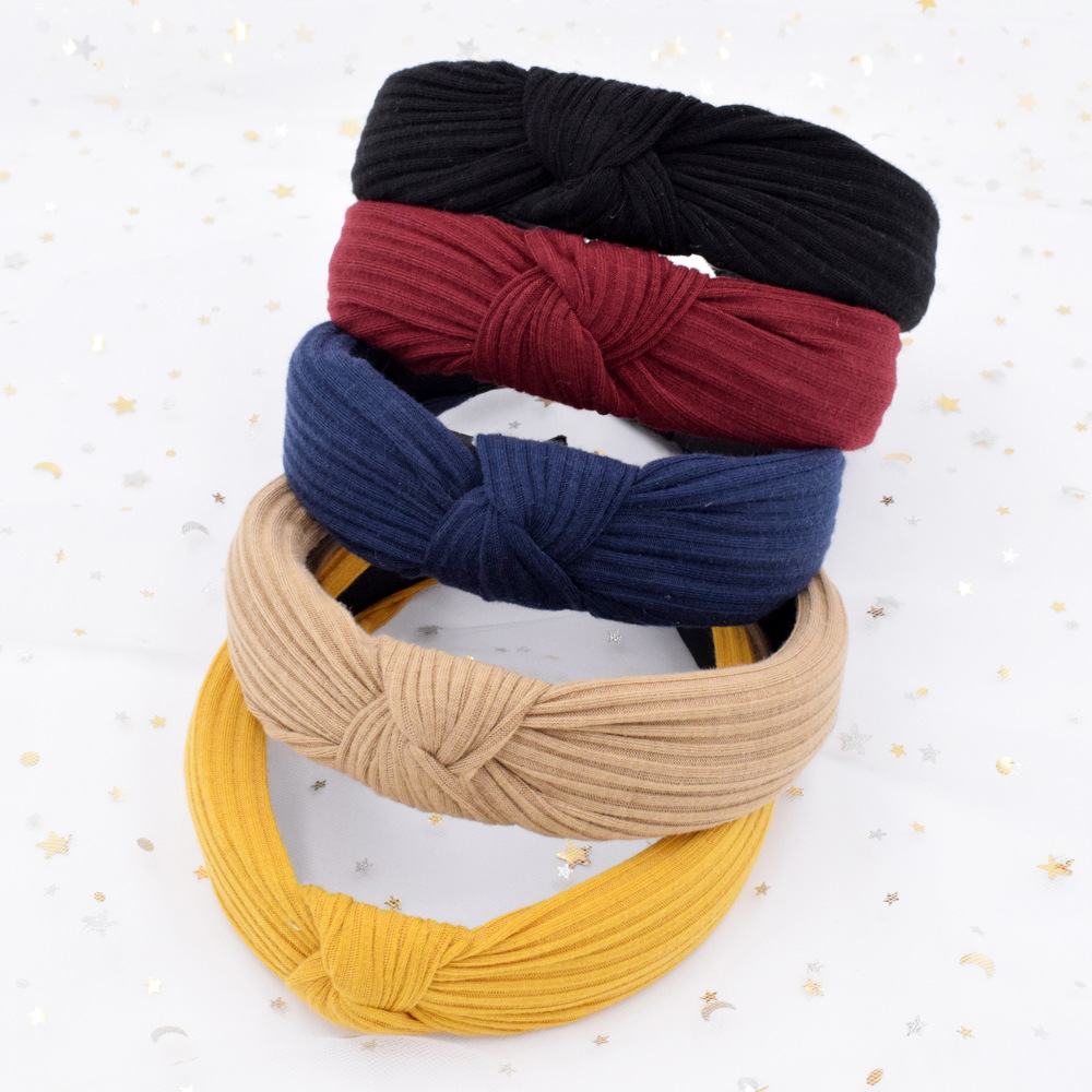 Wide-sided Knitted Striped Cross-knotted Headband Korean Fabric Simple Headband Wholesale display picture 1