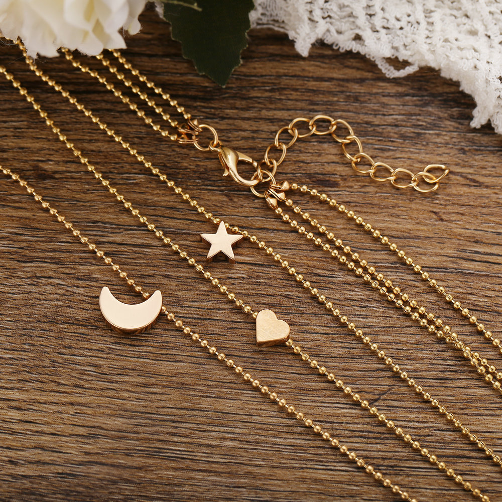 New Golden Pendant Clavicle Chain Creative Retro Simple Star Moon Love Pendant Necklace Wholesale Nihaojewelry display picture 5