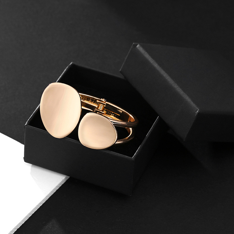 Hollow Asymmetrical Oval Alloy Open Bracelet
