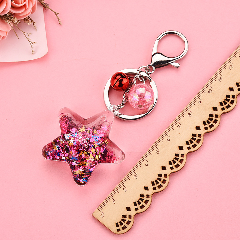 Korean Acrylic Five-pointed Star Flowing Sequins Keychain Wholesale Nihaojewelry display picture 3