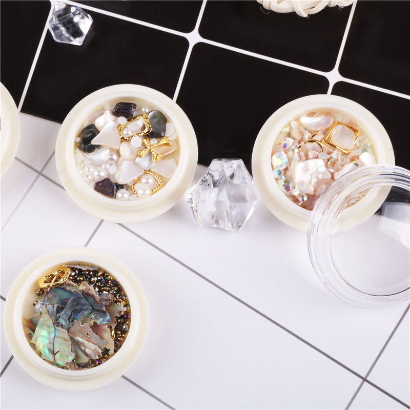 Transfronterizo de uñas rebanadas de abulón marino tormenta joyería remache micro diamante metal joyería caja blanca