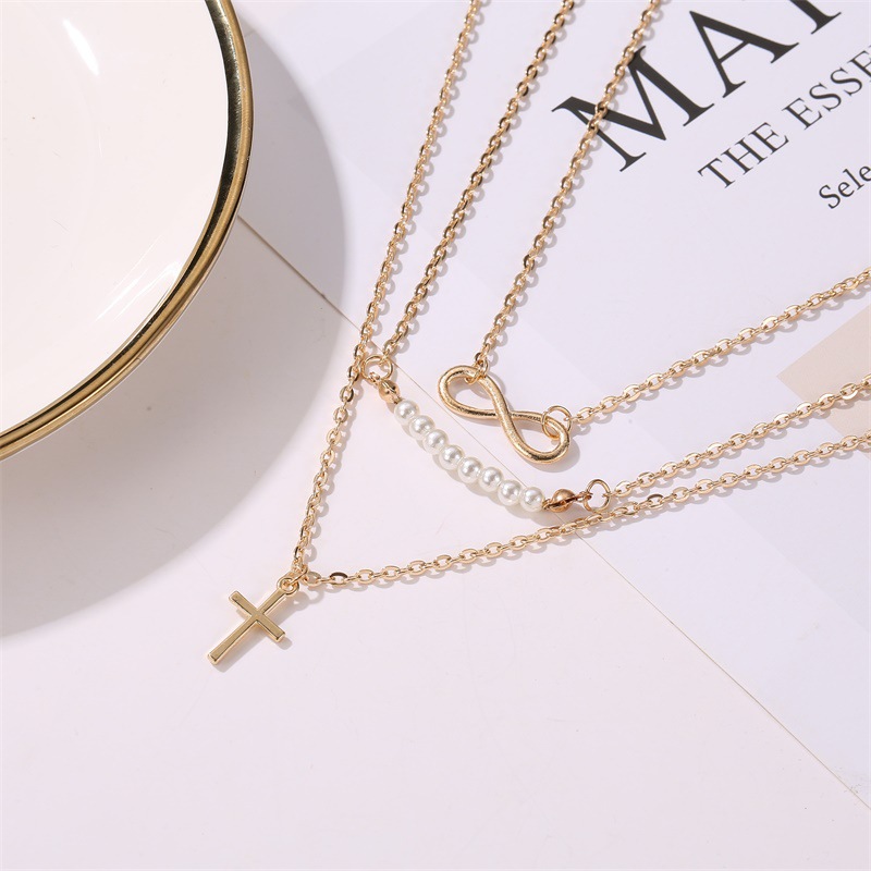 Best Selling Long Necklace 8 Word Pearl Multi-layer Necklace Cross Pendant Necklace Clavicle Chain Wholesale Nihaojewelry display picture 3