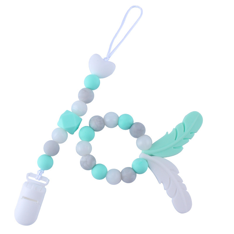 Productos para bebés de silicona chupete cadena mordedor pluma de dibujos animados de silicona juguete dientes molienda teether traje