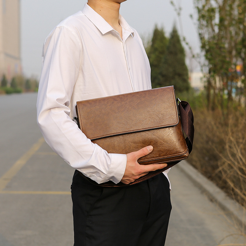 Cross-border special men's leather bag 2019 new business leisure PU shoulder diagonal cross bag multi-function solid color briefcase