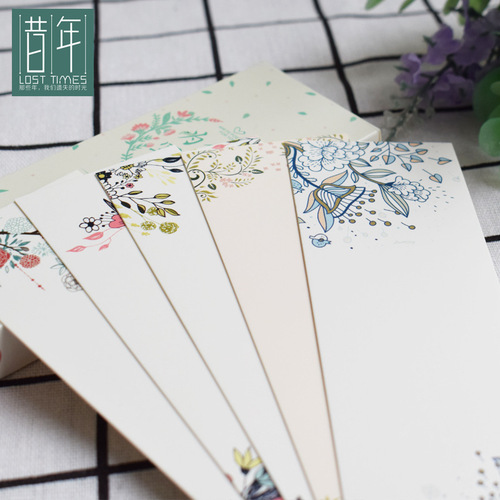 A beautifully crafted DIY card and bookmark with a theme of a paper bookmark featuring a romantic poem written for you in the past, adorned with a paper design of blooming flowers, creating an aesthetic and elegant bookmark.