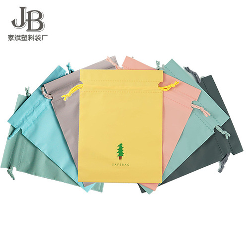 Wholesale matte drawstring storage bag with candy color for travel, children's clothing and plastic drawstring bag