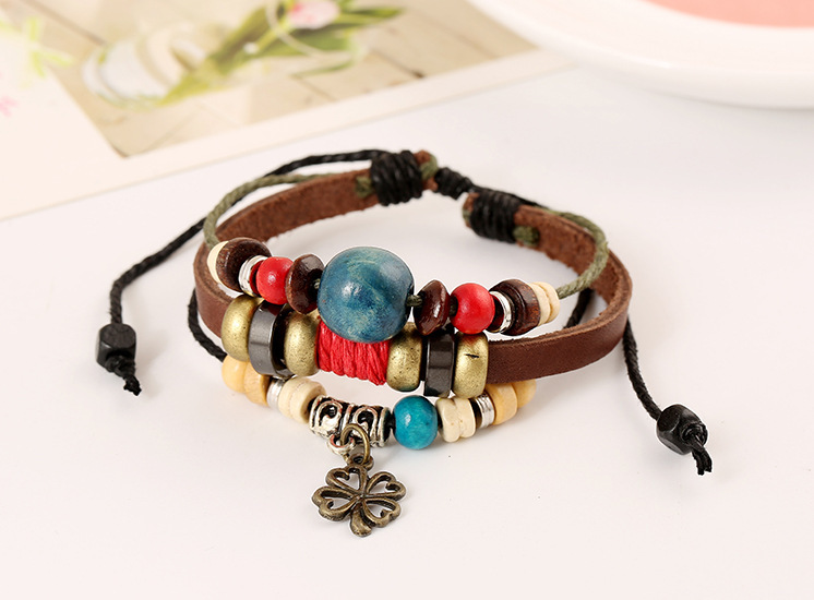 Retro Four Leaf Clover Pu Leather Alloy Beaded Layered Unisex Bracelets display picture 1