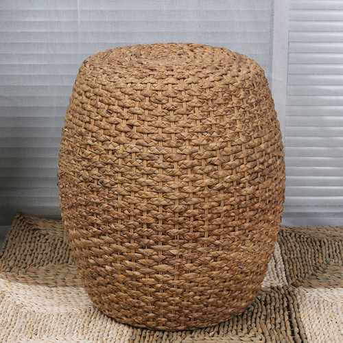 Hand-woven rattan seat with a simple, sturdy, and durable design, featuring an internal frame for support. Customizable rattan stool.