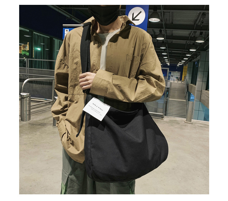 Japanese Harajuku Black Style Canvas Bag Women's New 2019ins Street Shooting College Style Solid Color Shoulder Messenger Bag display picture 30