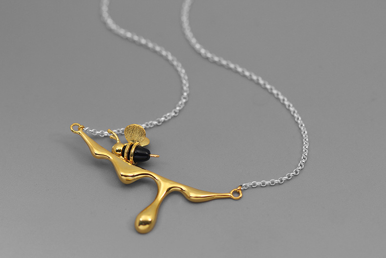 Close-up of Bee Necklace