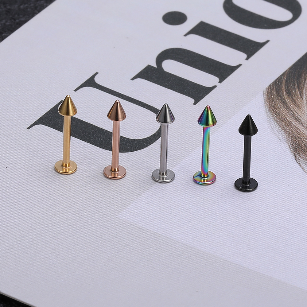Silver pointed spike labret stud material detail