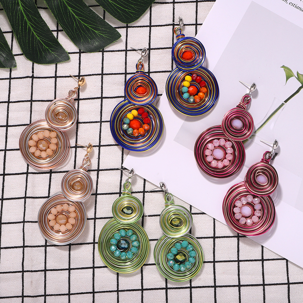 Hot Sale Alloy Winding Earrings Creative Resin Flower Earrings display picture 8