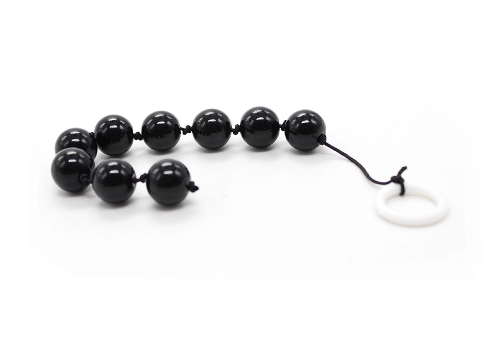 Tienda de fábrica al por mayor juguetes sexuales negro tire perlas cristal pull beads back Court anal plug cuentas aparatos femeninos