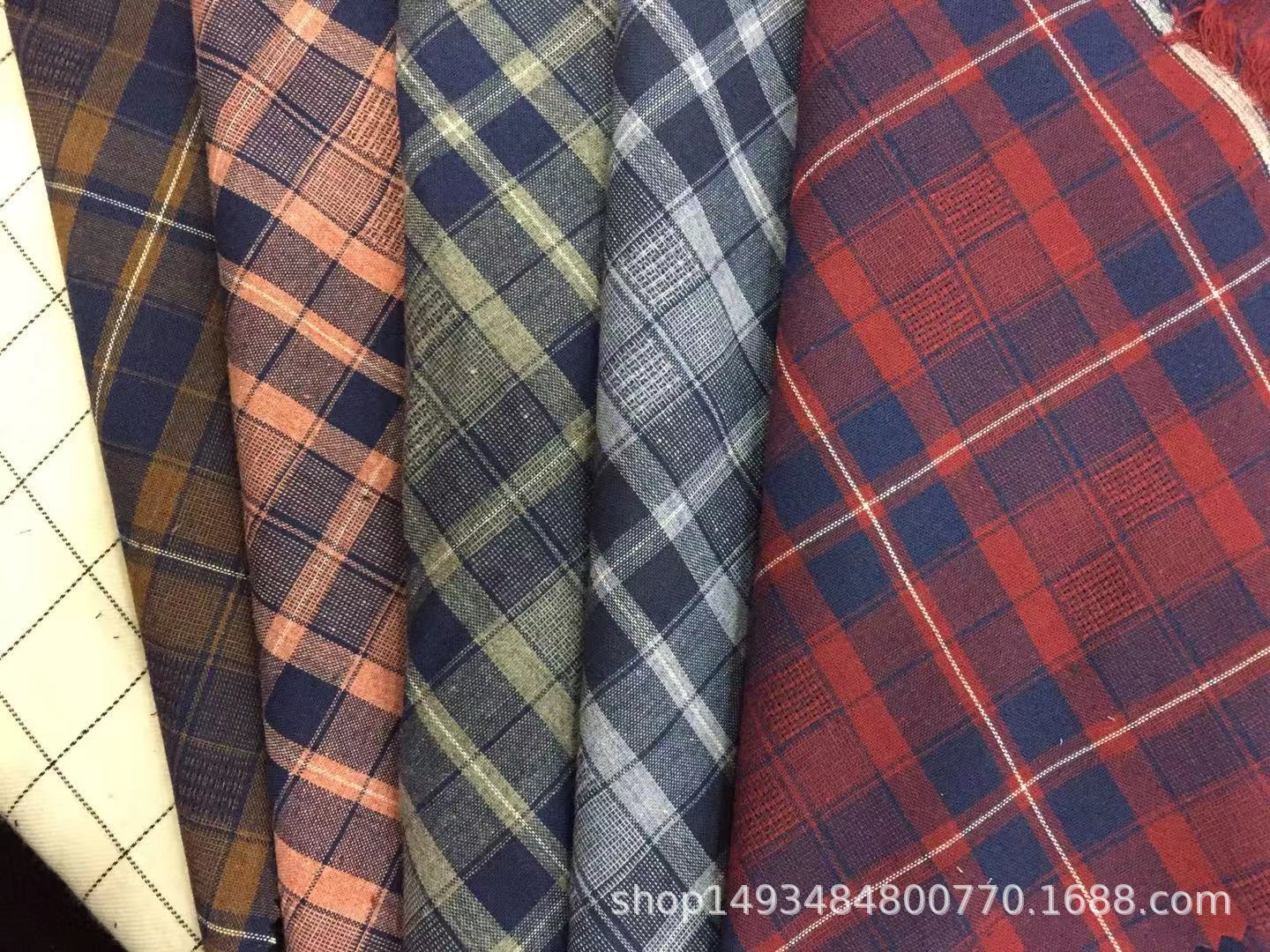 厂家直销现货供应21支色织格子布涤棉提花布单面磨毛款衬衫面料