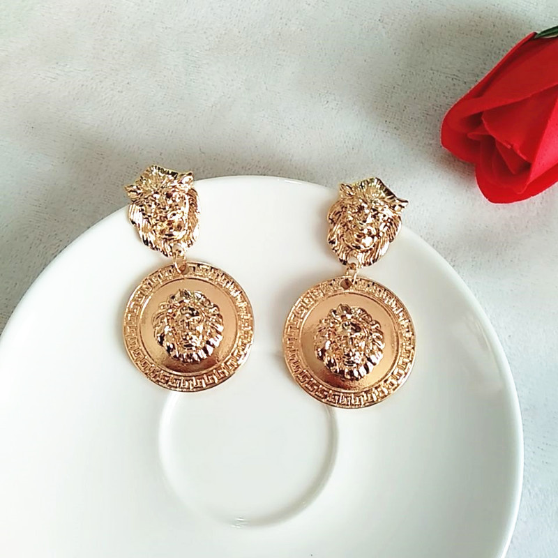 Simple Embossed Lion Head Metal Earrings display picture 3