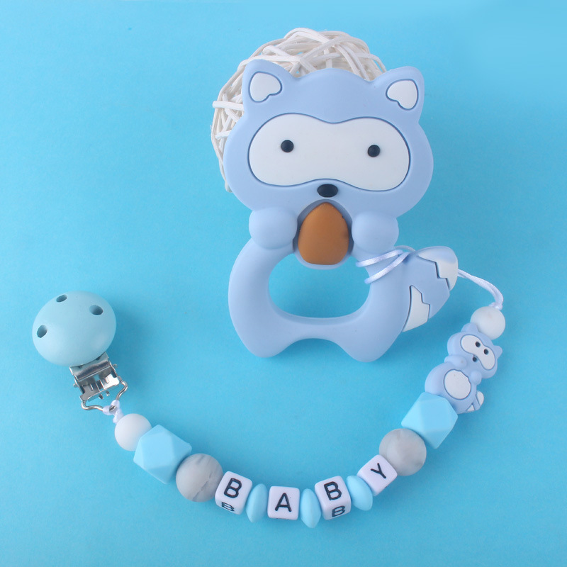 Teether chupete cadena bebé chupete de silicona clip Amazon Comercio exterior teether traje nuevo mapache la historieta