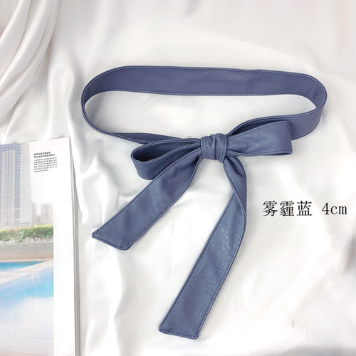 Leather-wrapped belt with fur decoration, PU leather strap, minimalist leather belt with bow detail, suitable for trench coats and overcoats.