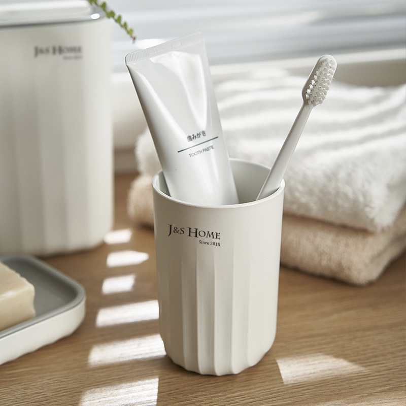 Estilo nórdico simple cepillo de dientes taza baño pareja onda patrón de plástico cepillo de dientes de almacenamiento taza de lavado simple