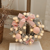 30cm pink flocking wreath in the window