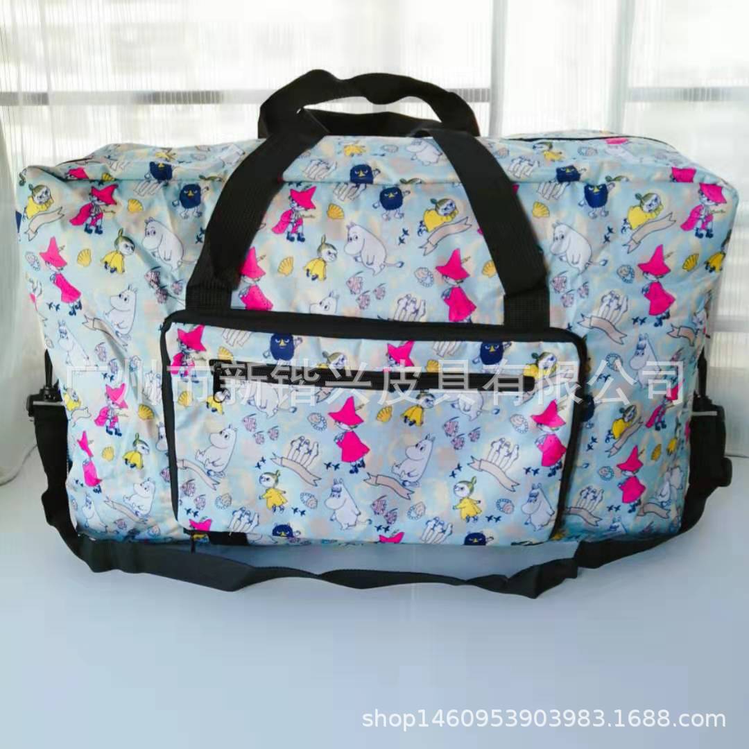 布丁犬玉桂犬美楽蒂k.t防水アニメ携帯折りたたみ旅行バッグはスーツケースに固定できます。