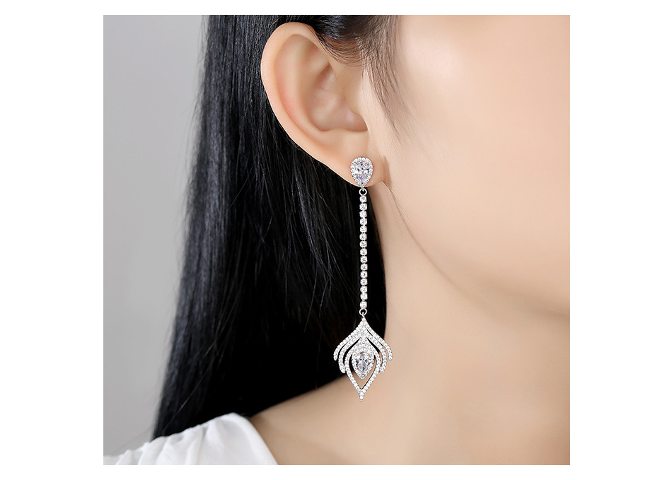 Jinse Vogel Feder Ohrringe Koreanische Mode Neue Feder Lange Anhänger Ohrringe Frauen Kupfer Eingelegtes Zirkonium Ohrringe Ohrringe display picture 4