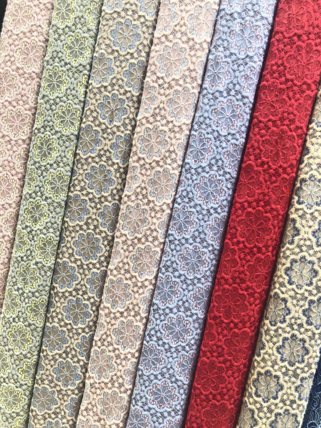 厂家直销新版现货的羽毛纱圈圈花朵蕾丝面料